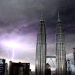 Photo Author: Andy Mitchell, ©2009, Creative Commons Attribution-ShareAlike 2.0 Generic License, courtesy of Wikipedia Commons, https://commons.wikimedia.org/wiki/File:Petronas_Towers_during_lightning_storm_(3324769707).jpg 